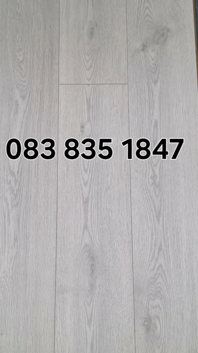 New 7mm java dark grey laminated flooring - Image 1