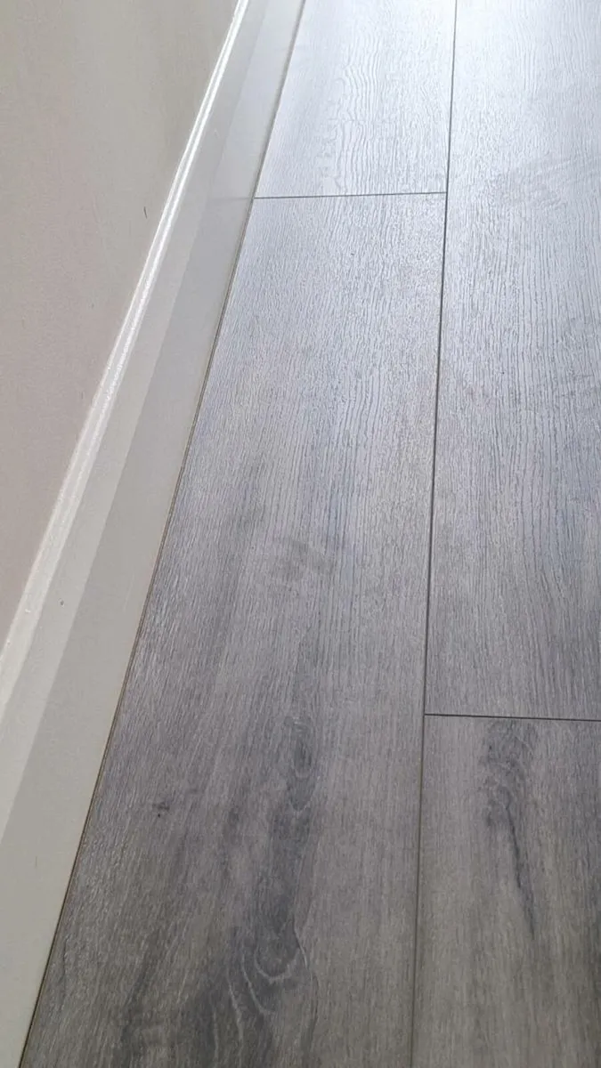 New 7mm Malaga light grey laminated flooring - Image 2