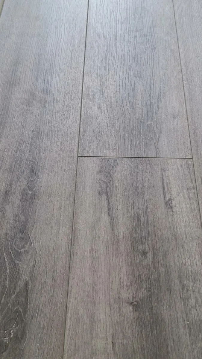 New 7mm Malaga light grey laminated flooring - Image 3