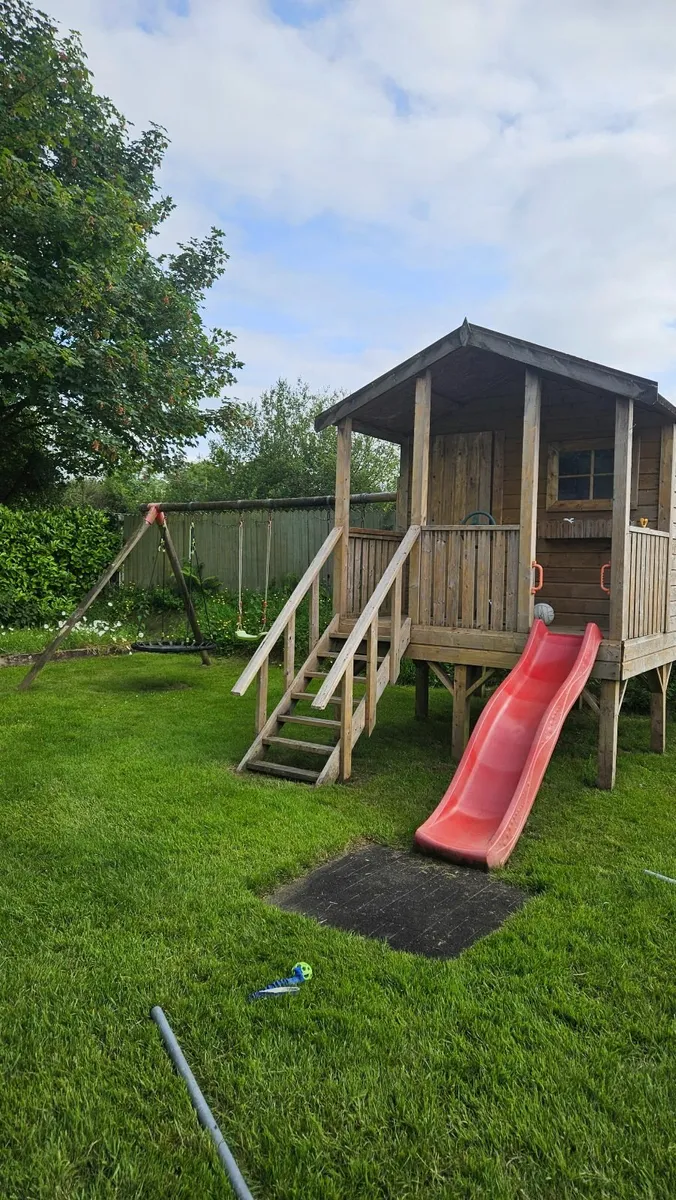 Playhouse with swing set