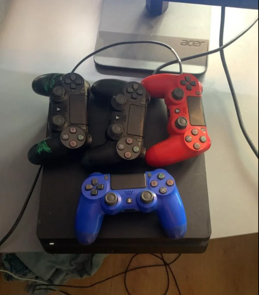 PS4 Slim + 4 Dualshock Controllers - Image 1