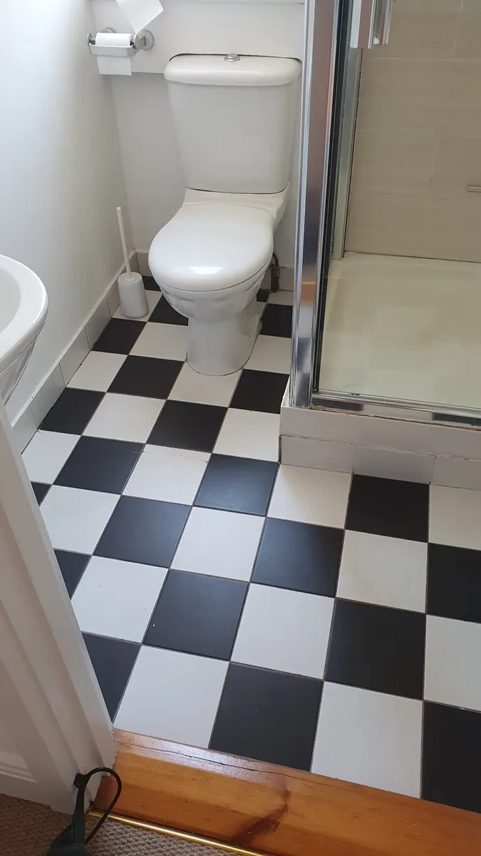 Black and white Matt satin floor tiles. - Image 1