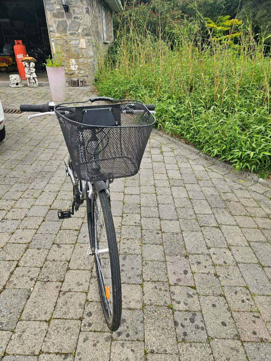 A ladies & a man's bike. - Image 1