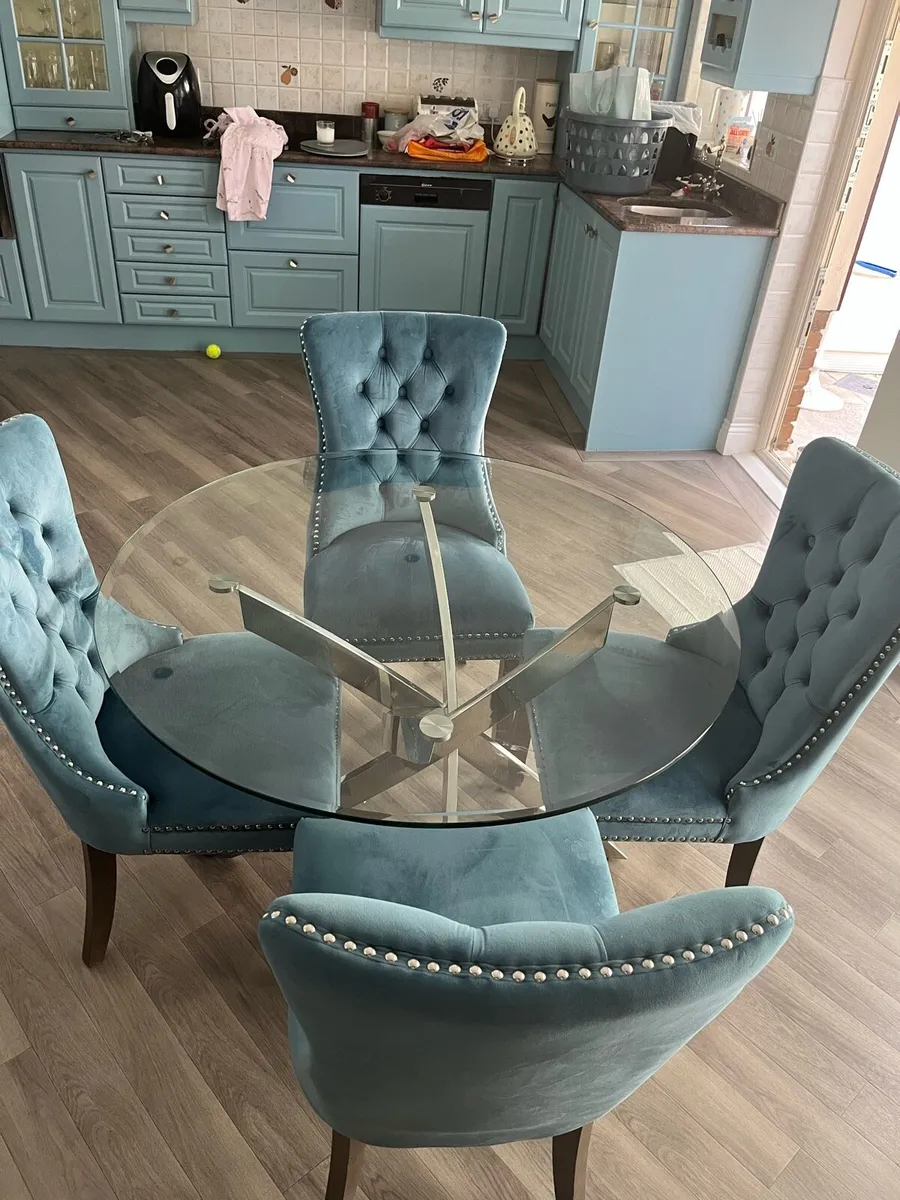 Round glass kitchen table and 4 blue chairs - Image 2