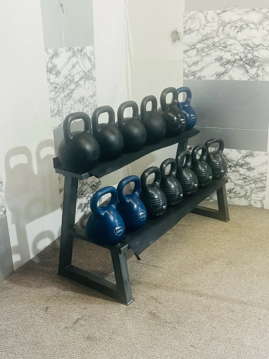 Collection of kettlebells with rack - Image 2
