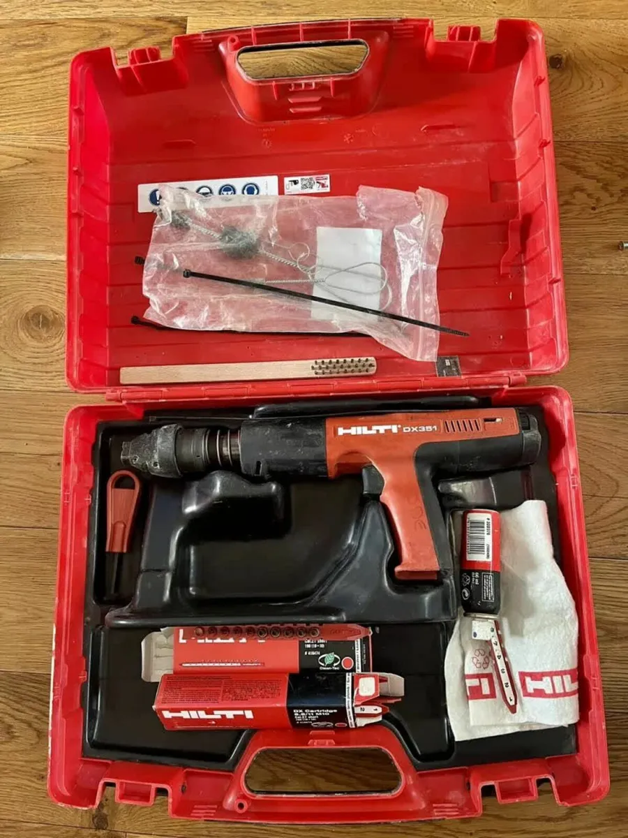 Hilton DX351 nail gun powder tool with case - Image 1