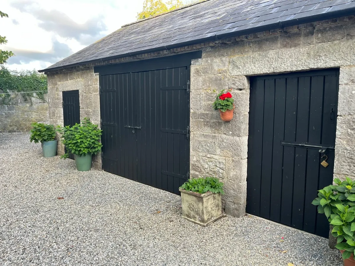 Courtyard and Garage Doors - Image 1