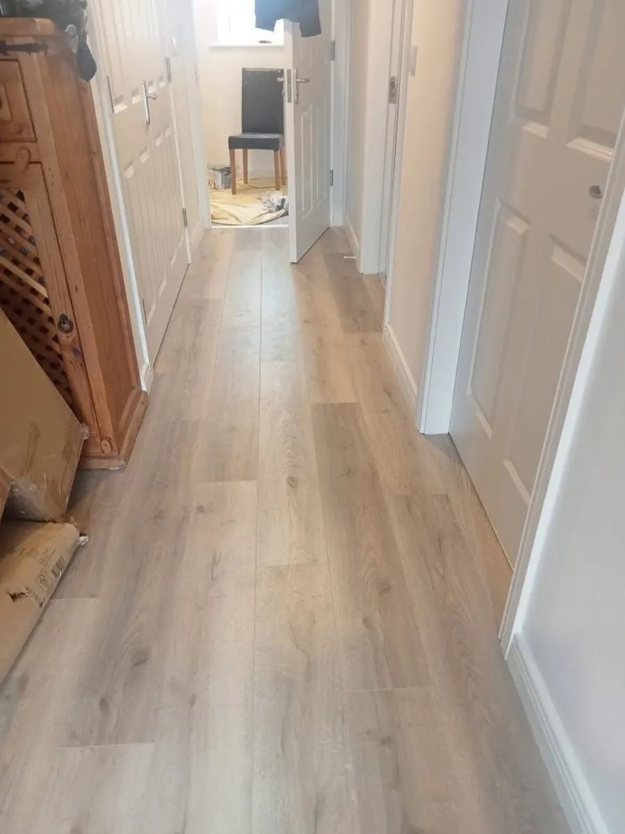 New 8mm Beige Laminated Flooring - Image 3