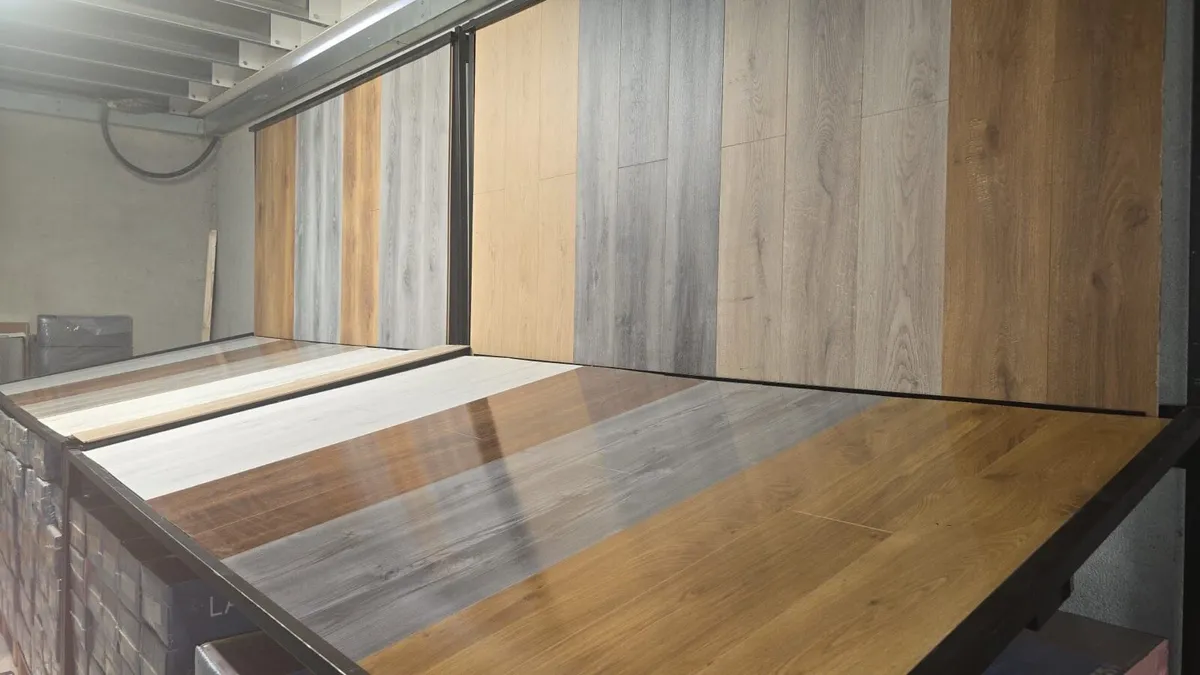 New 8mm Beige Laminated Flooring - Image 1