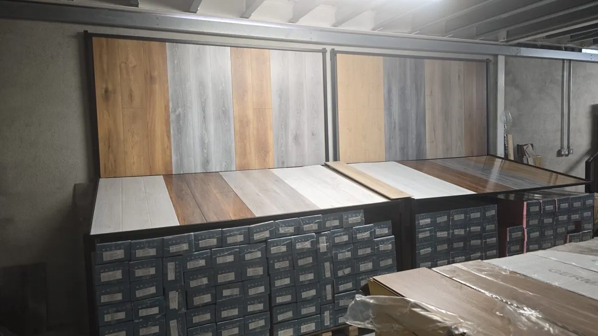New 8mm Beige Laminated Flooring - Image 1