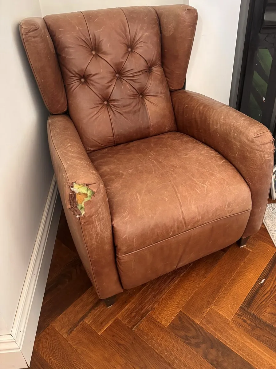 Brown leather recliner chair