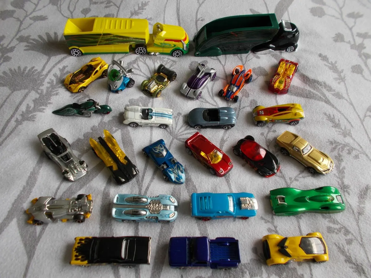 Lot of 25 Hot Wheels model cars and trucks - Image 1