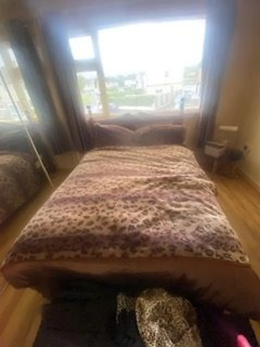 Double bed with Pine headboard
