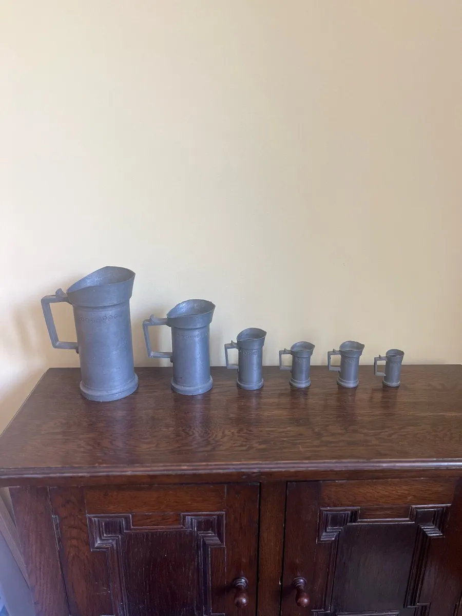 Set of Graduating Pewter Tankards - Image 1