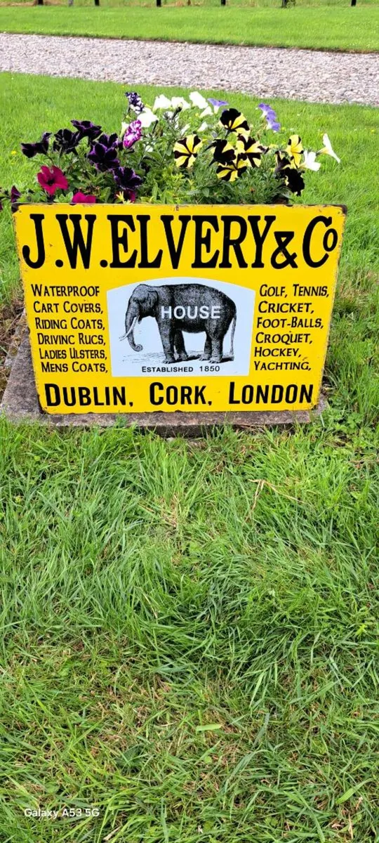 Large  jw everly metal sign