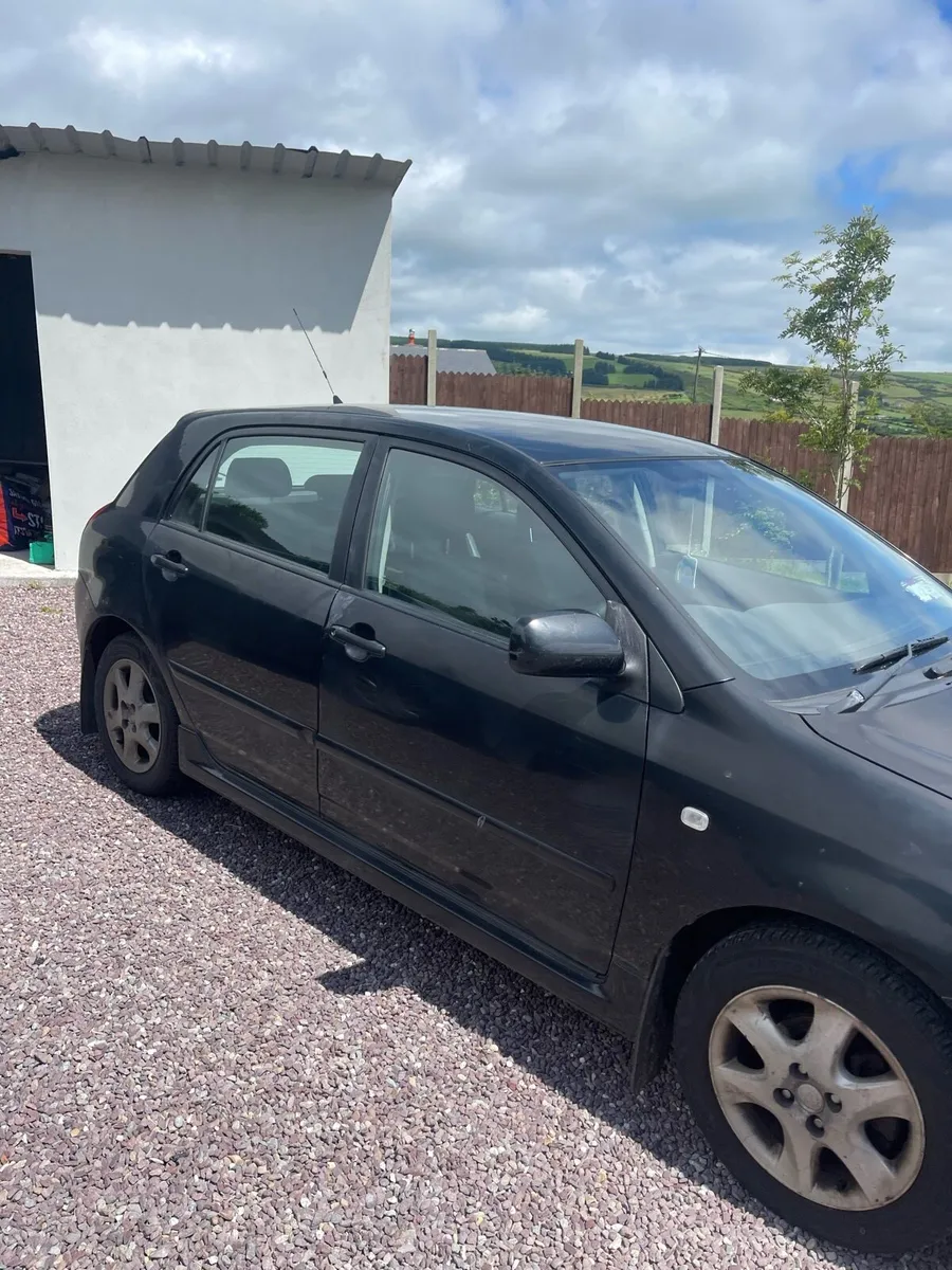 2006 Black Toyota Corolla - Image 2