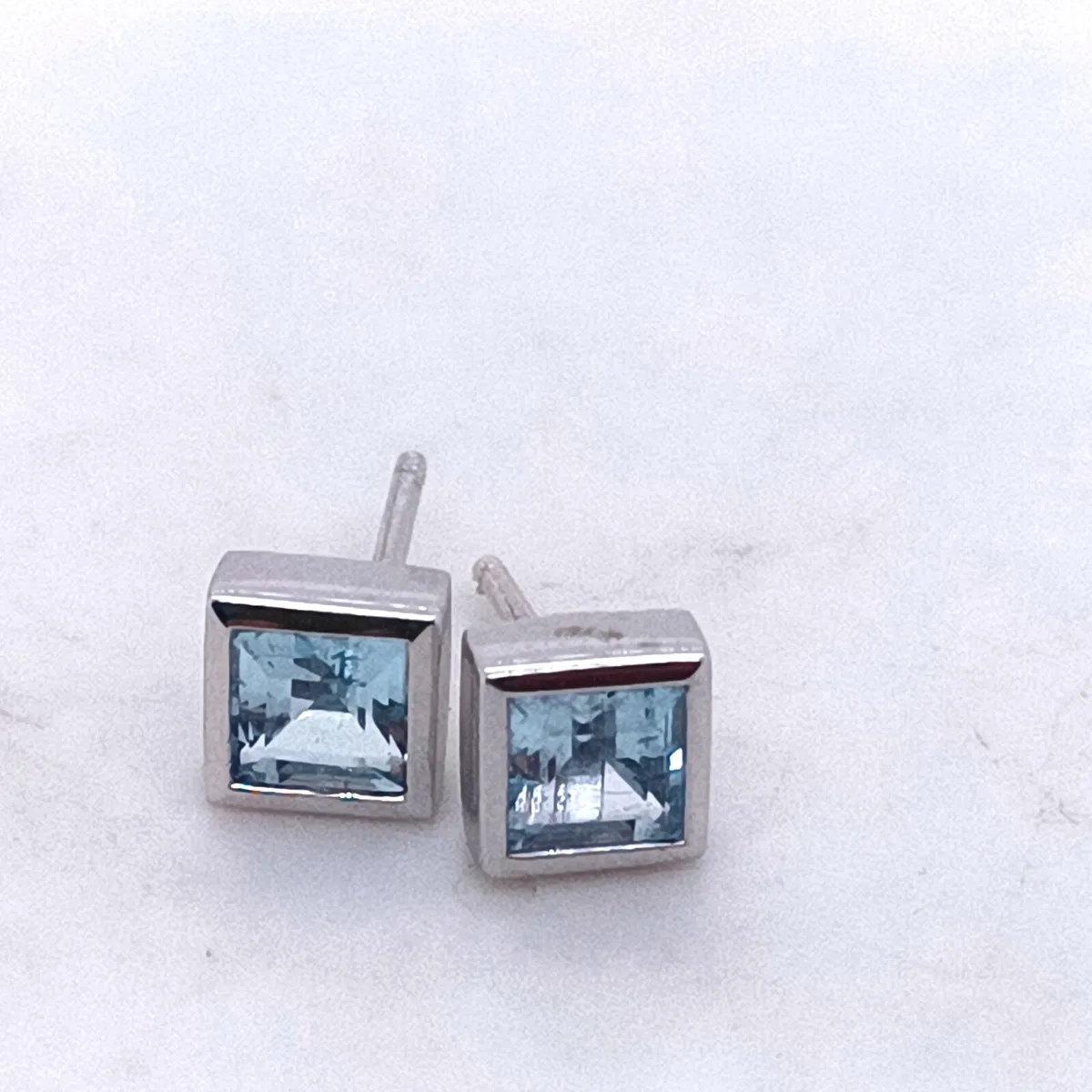 Princess Cut Blue Topaz Earrings 9k Gold - Image 1