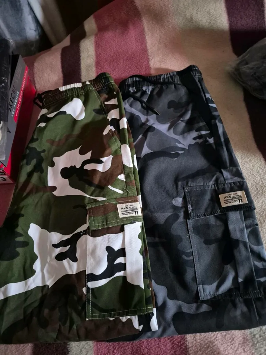 2 NEW PAIRS OF CARGO PANTS - Image 1
