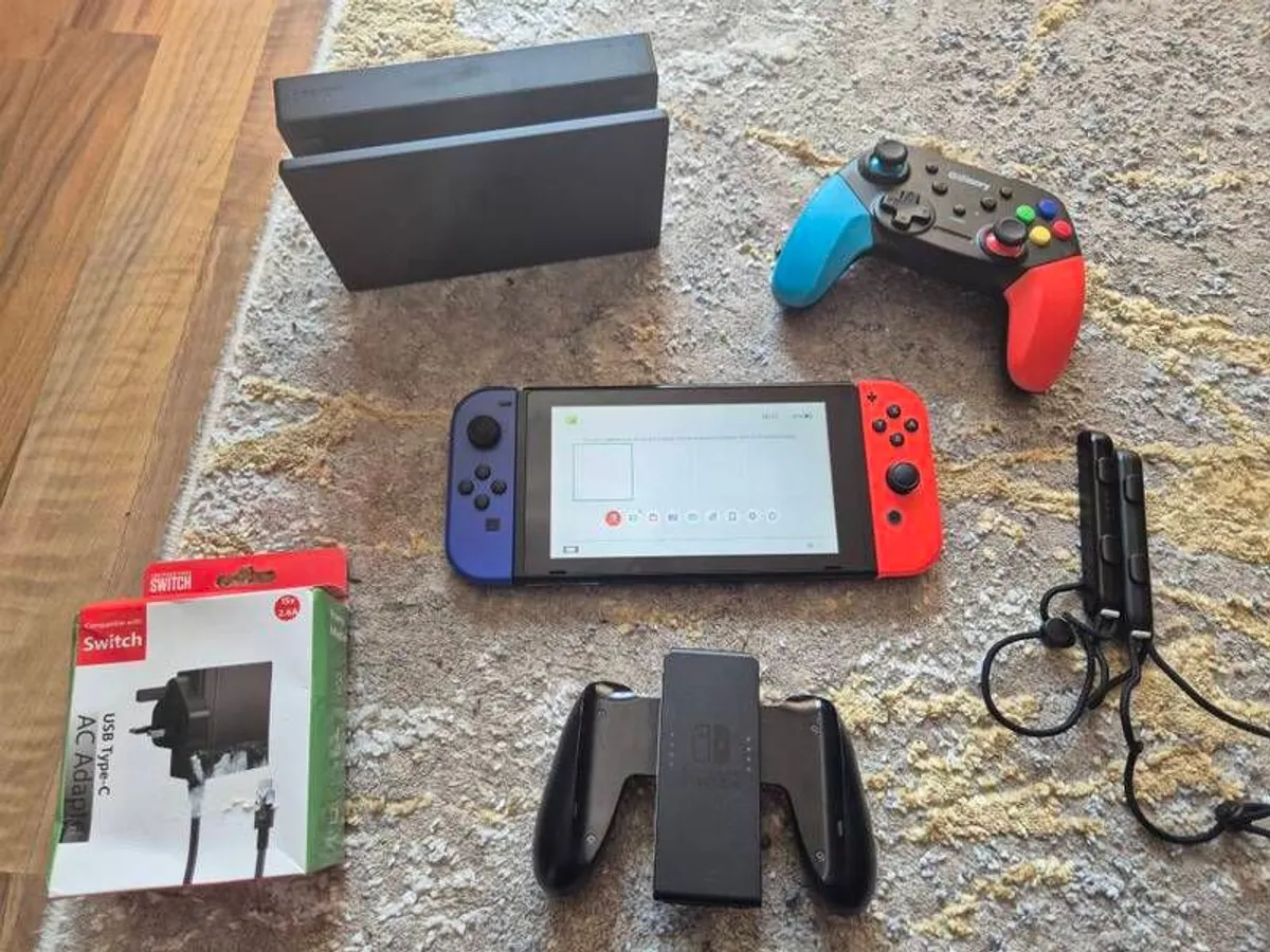 Nintendo Switch with accessories - Image 1