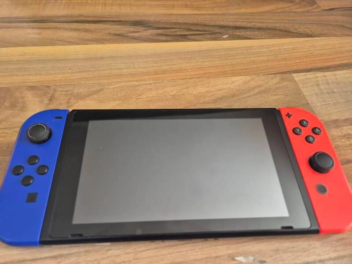 Nintendo Switch with accessories - Image 2