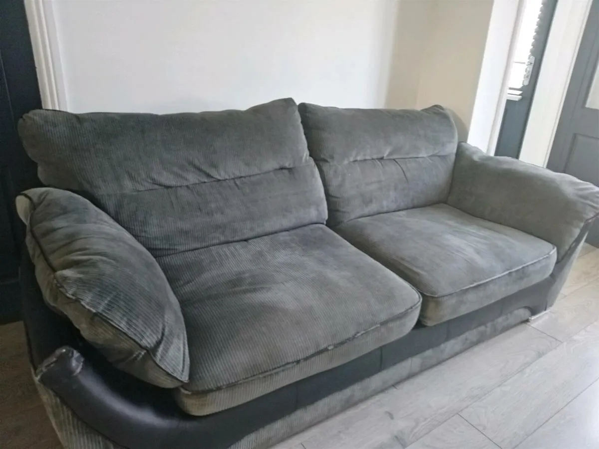 Grey sofa needs a Bit of TLC on edge sofa as seen - Image 1