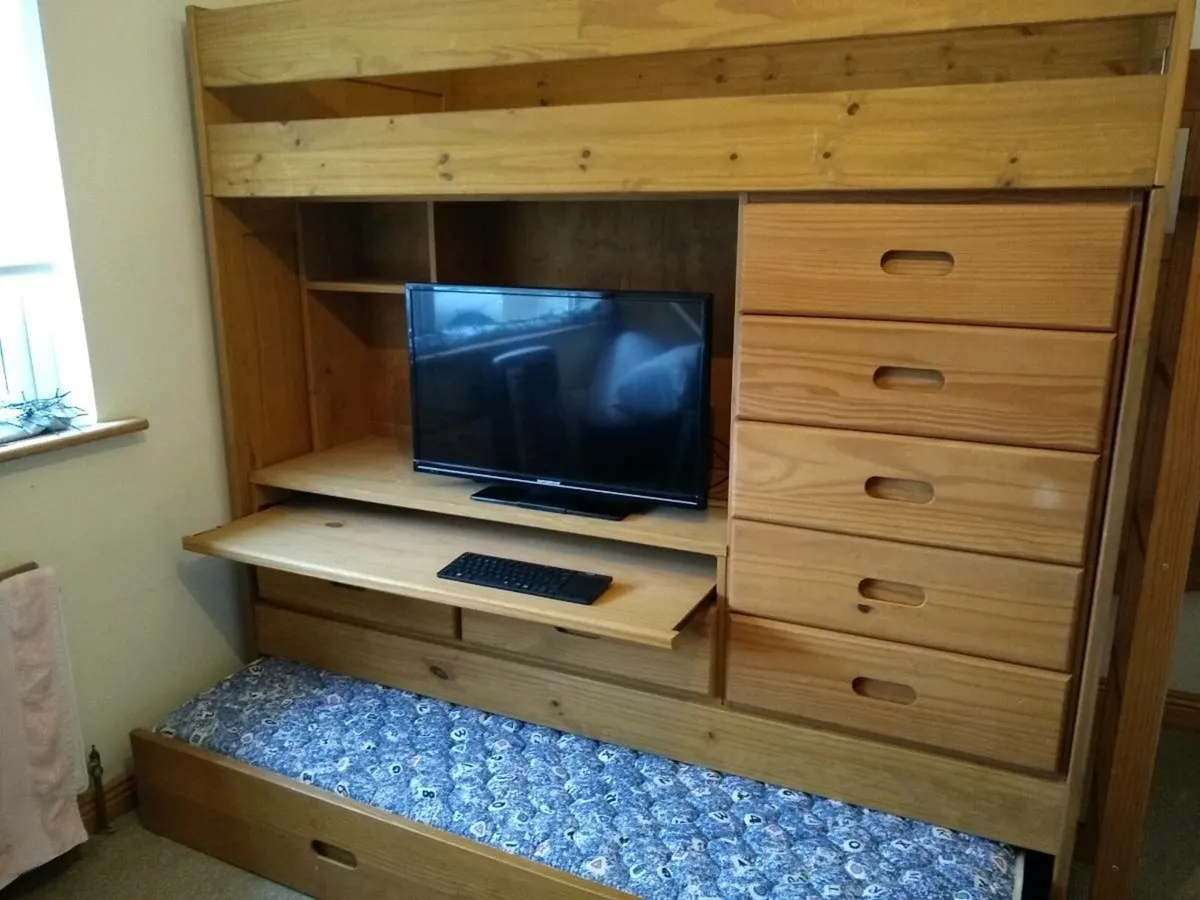 Bunk bed with Entertainment section and storage. - Image 1