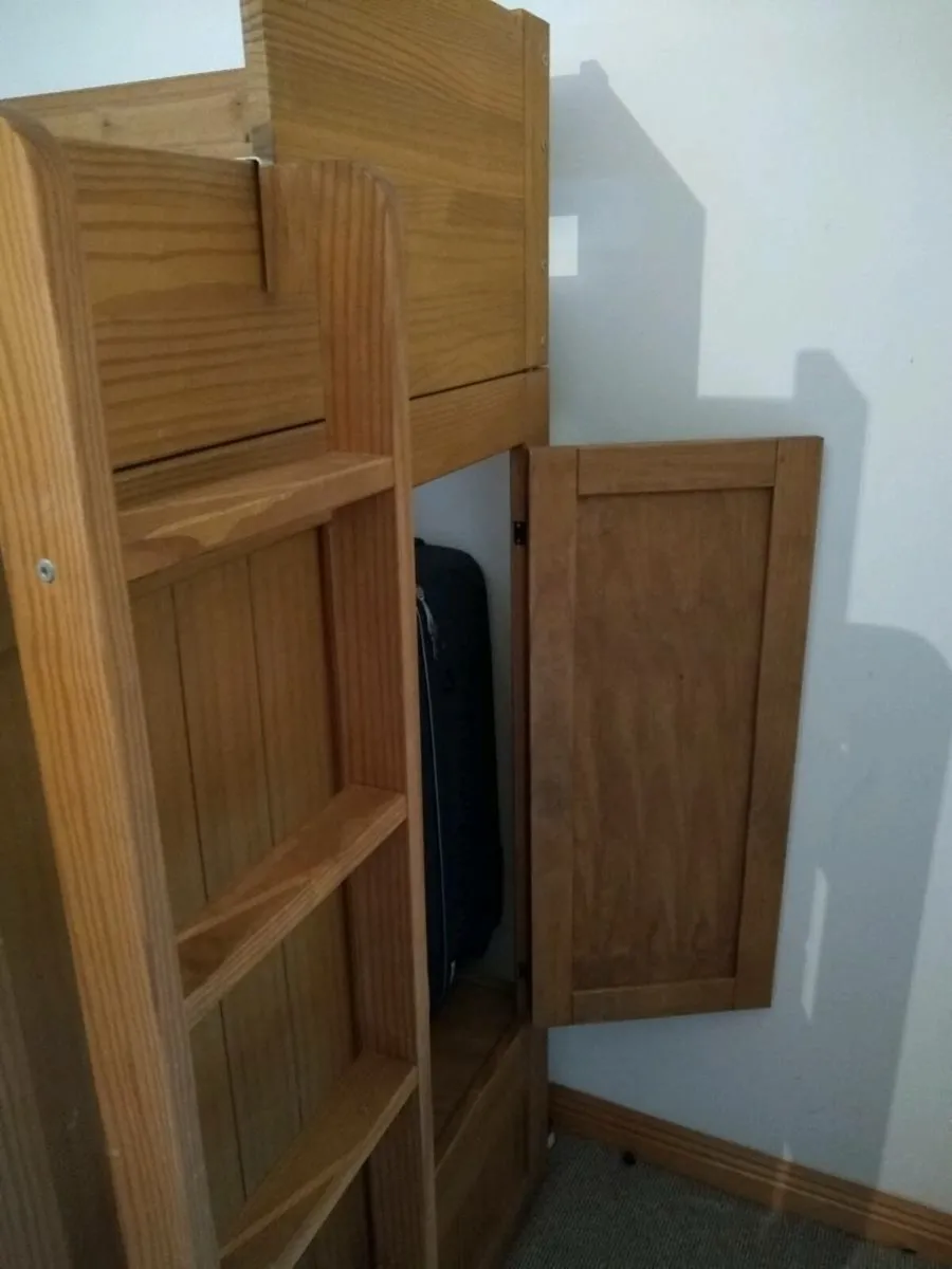 Bunk bed with Entertainment section and storage. - Image 4