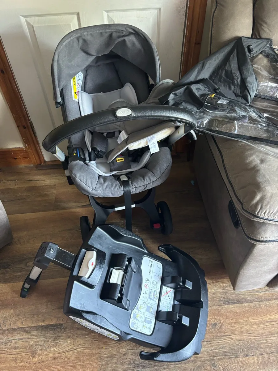 Donna + Carseat/stroller with isofix base - Image 1