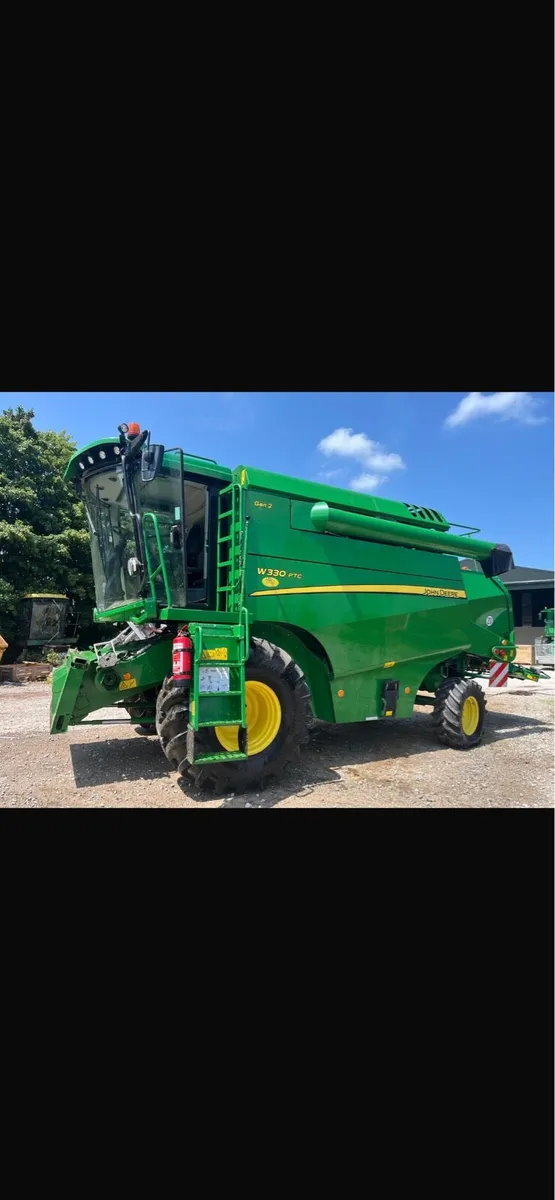 John Deere W330 combine - Image 1