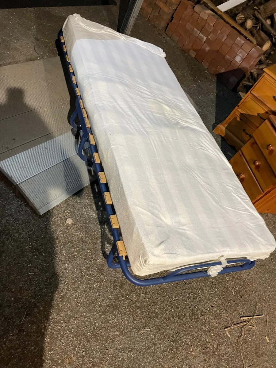 Single foldable guest bed + mattress - Image 1