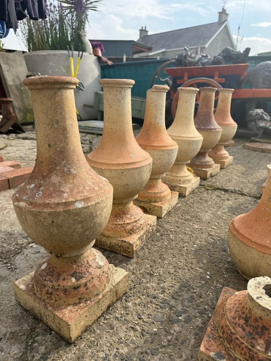 Feature historical terracotta pieces. - Image 1