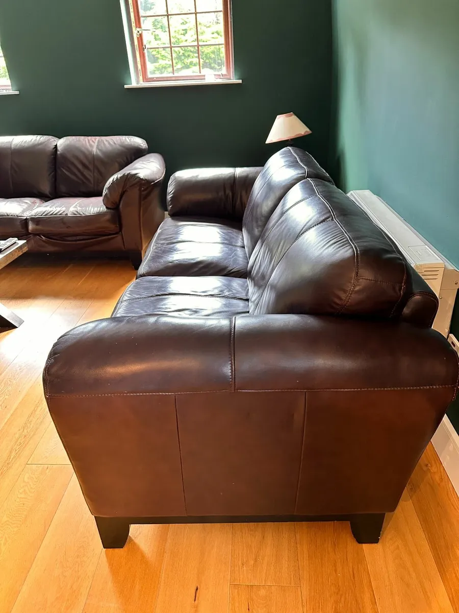 Two leather sofas (purple/brown) - Image 1