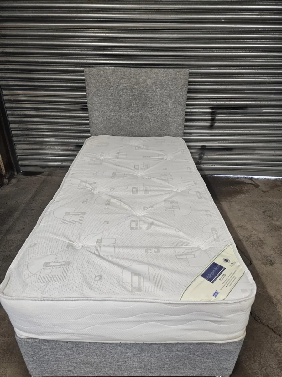 Single bed with headboard and mattress