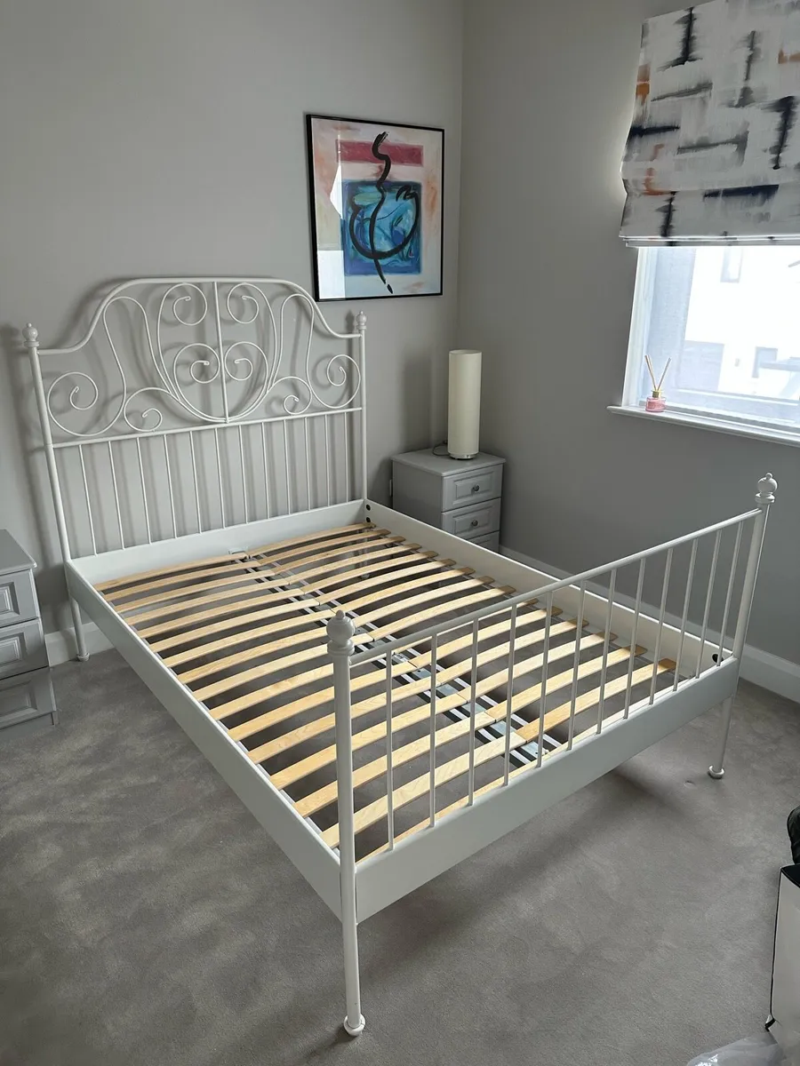 4’ 6” Metal frame bed with mattress - Image 1