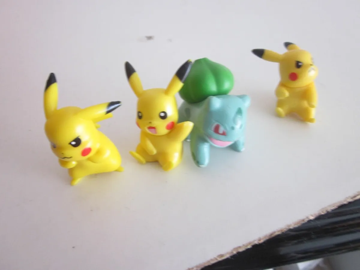 Four  Pokermon Mini Figures - Image 1