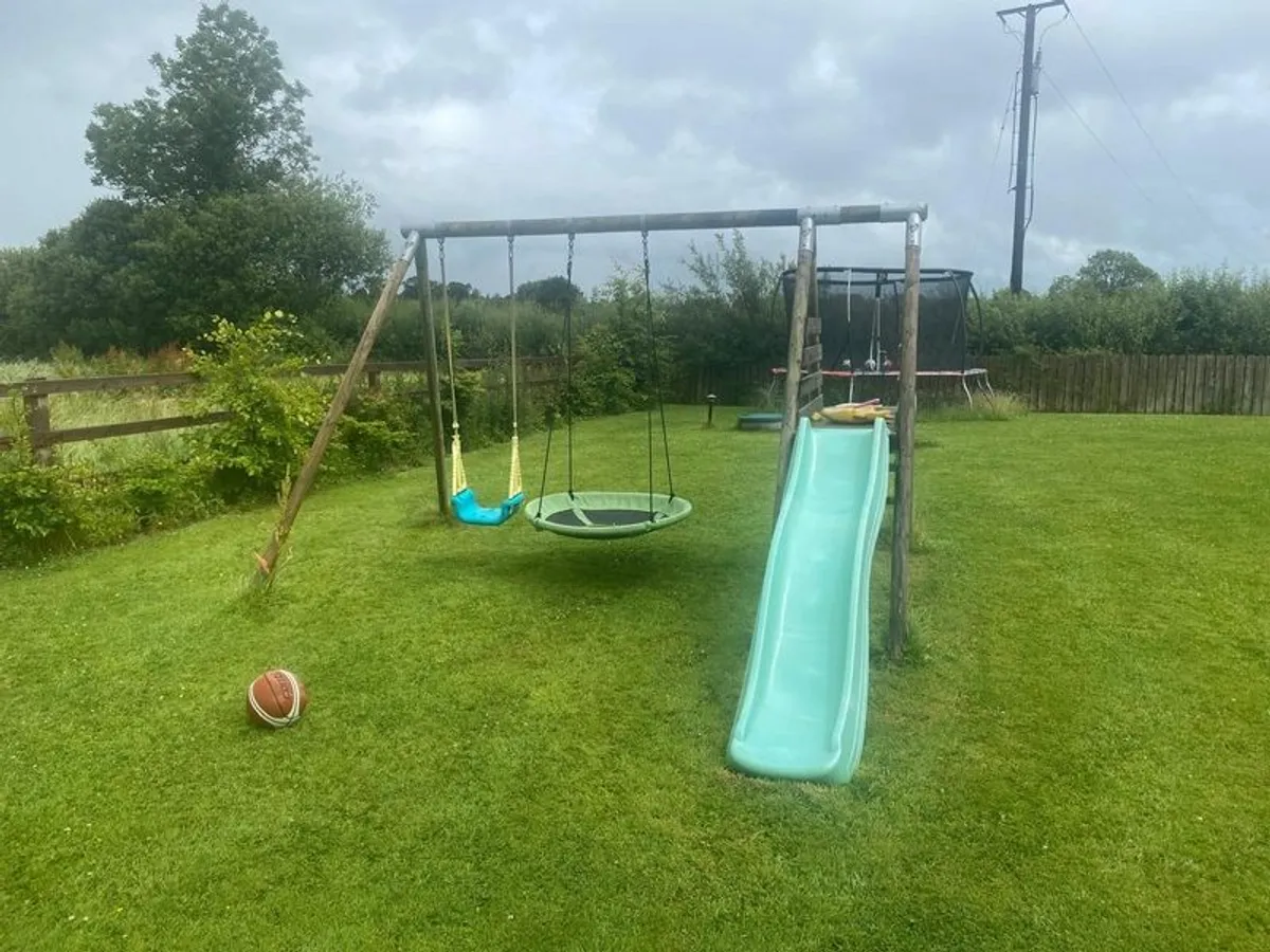 Wooden play centre swing set - Image 1