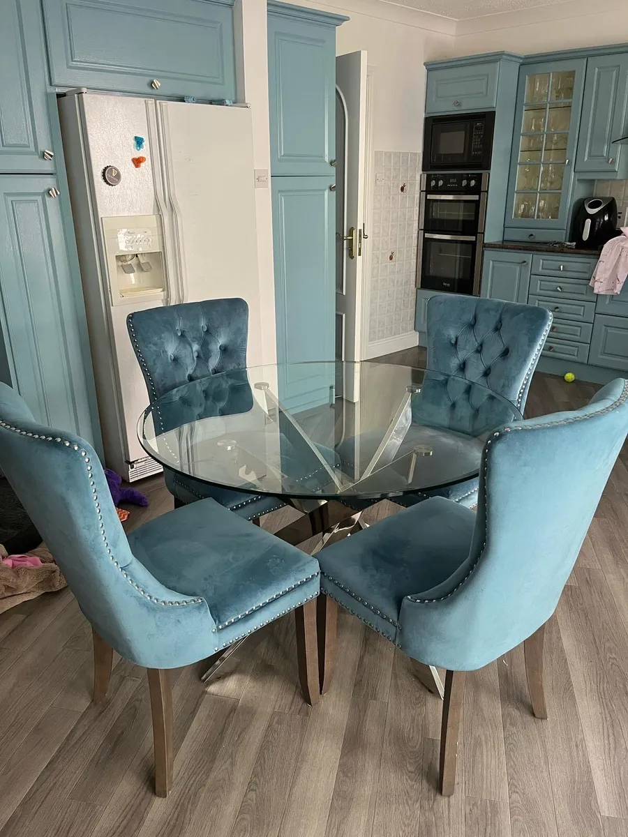 Glass Kitchen Table and 2 sets of blue chairs - Image 1
