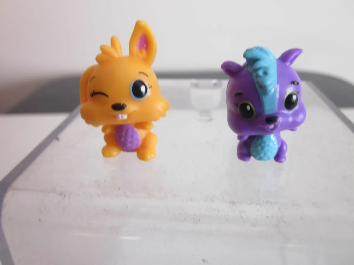 Hatchimals Bunwee Orange and  Purple Skunk - Image 1