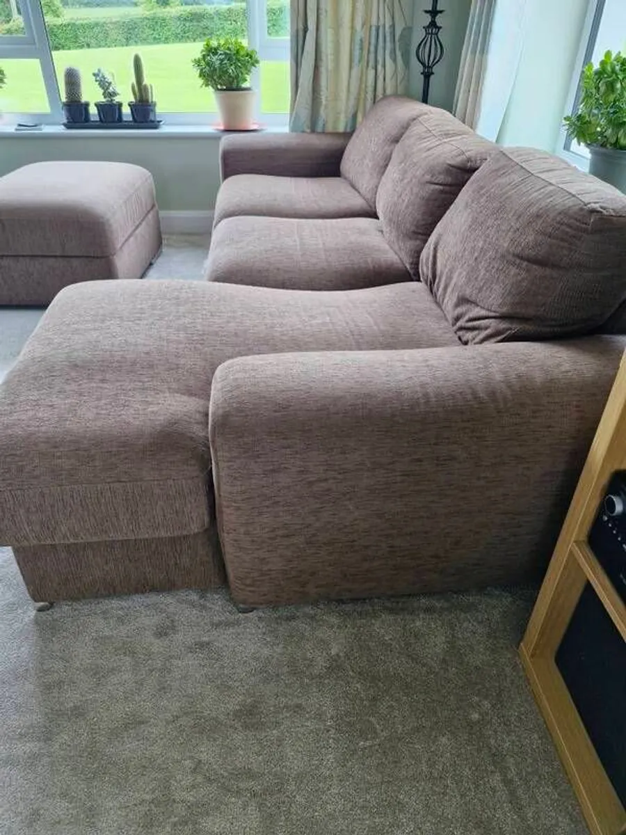 LShaped sofa with pouffe round table four stools - Image 2