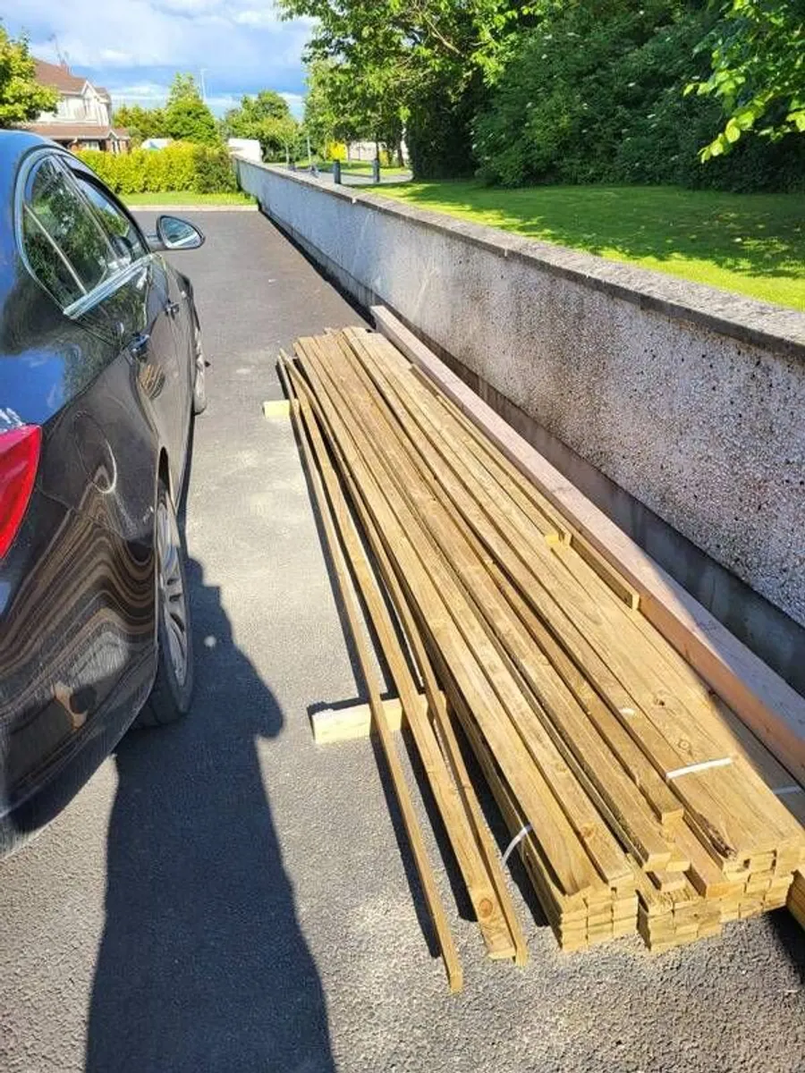 50 lenghts 2x1 treated timber . - Image 3