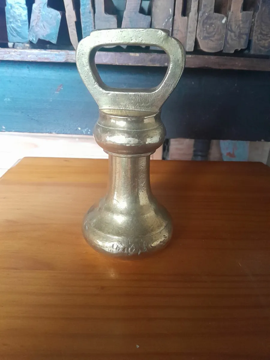 Solid  brass  weight