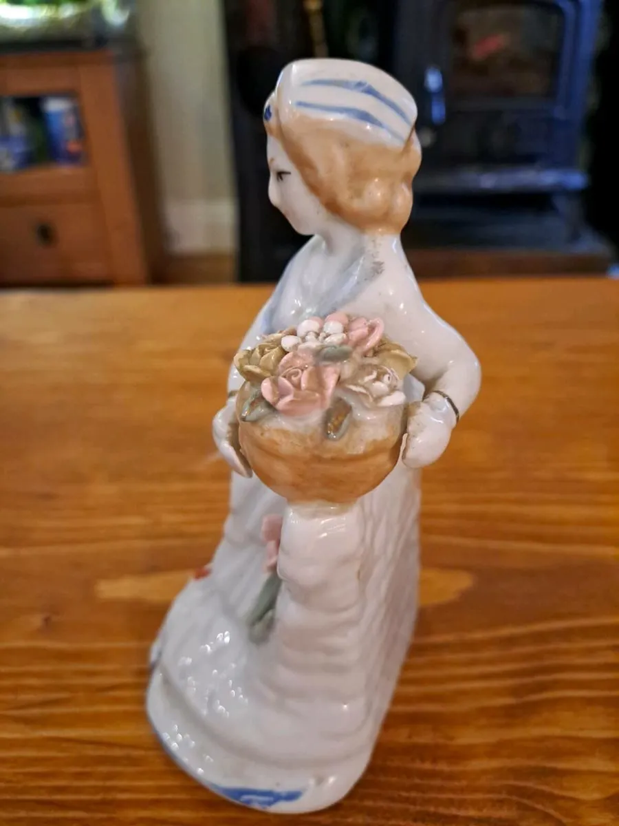 Vintage woman porcelain figurine detailed flowers - Image 3