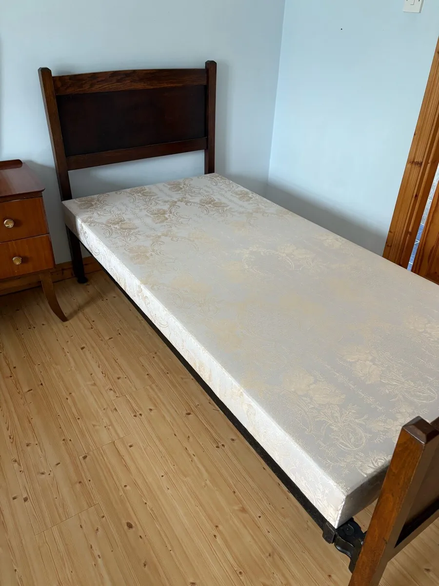 Wooden bed with iron railing - Image 1