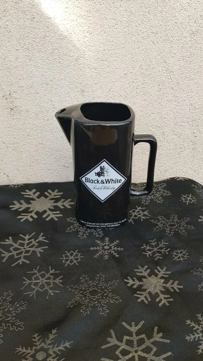 Black and white whiskey pitcher postage possible