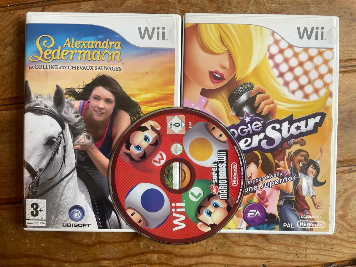 Nintendo Wii Bundle, 4 Controllers, 3 Games - Image 4
