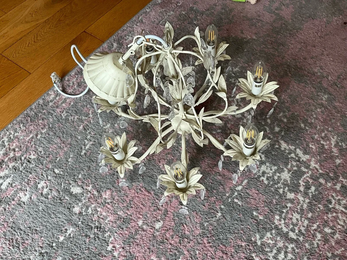 Antique style lighting fixture