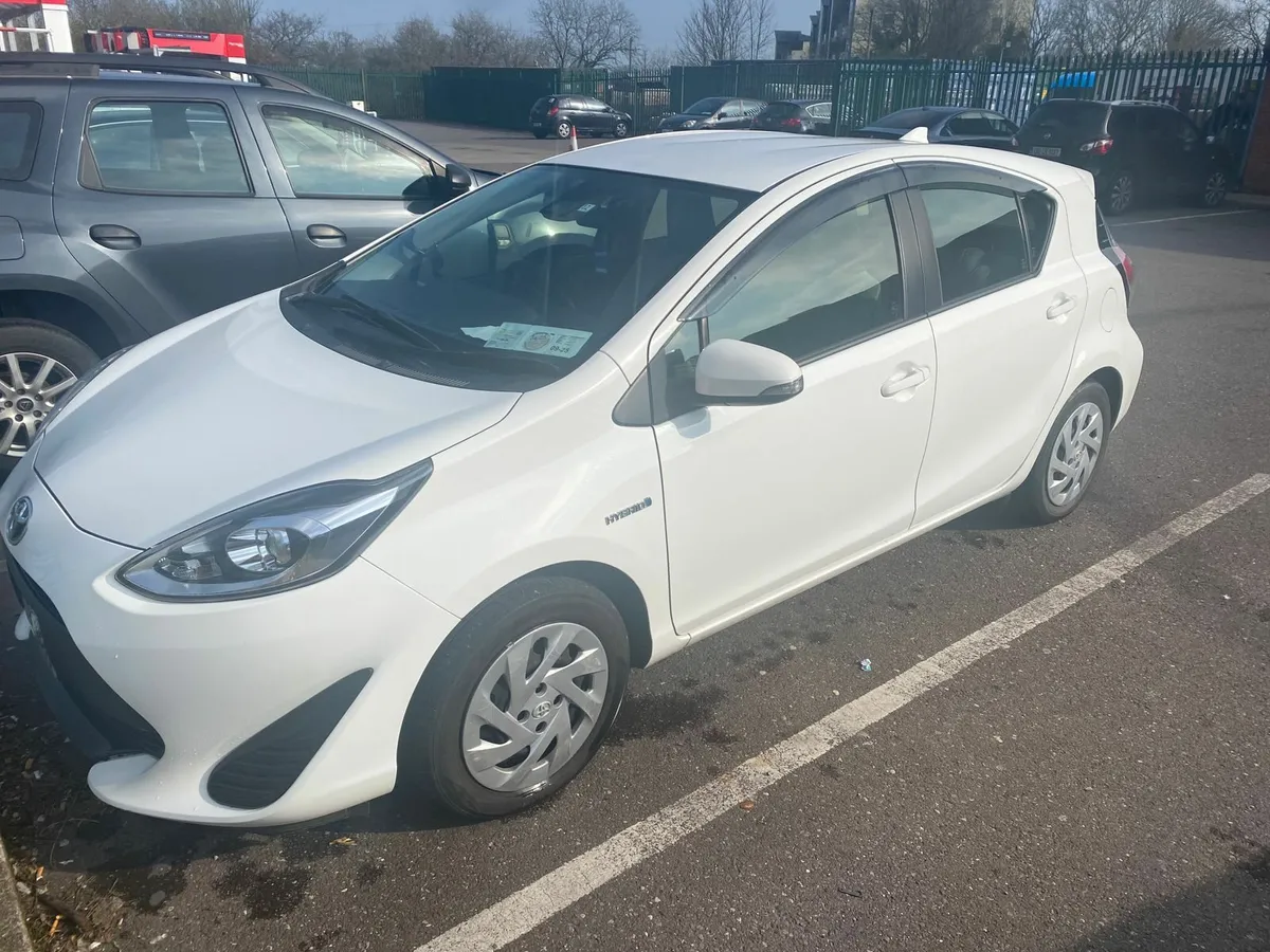 Toyota Aqua 2018 Automatic White Low Milage - Image 1