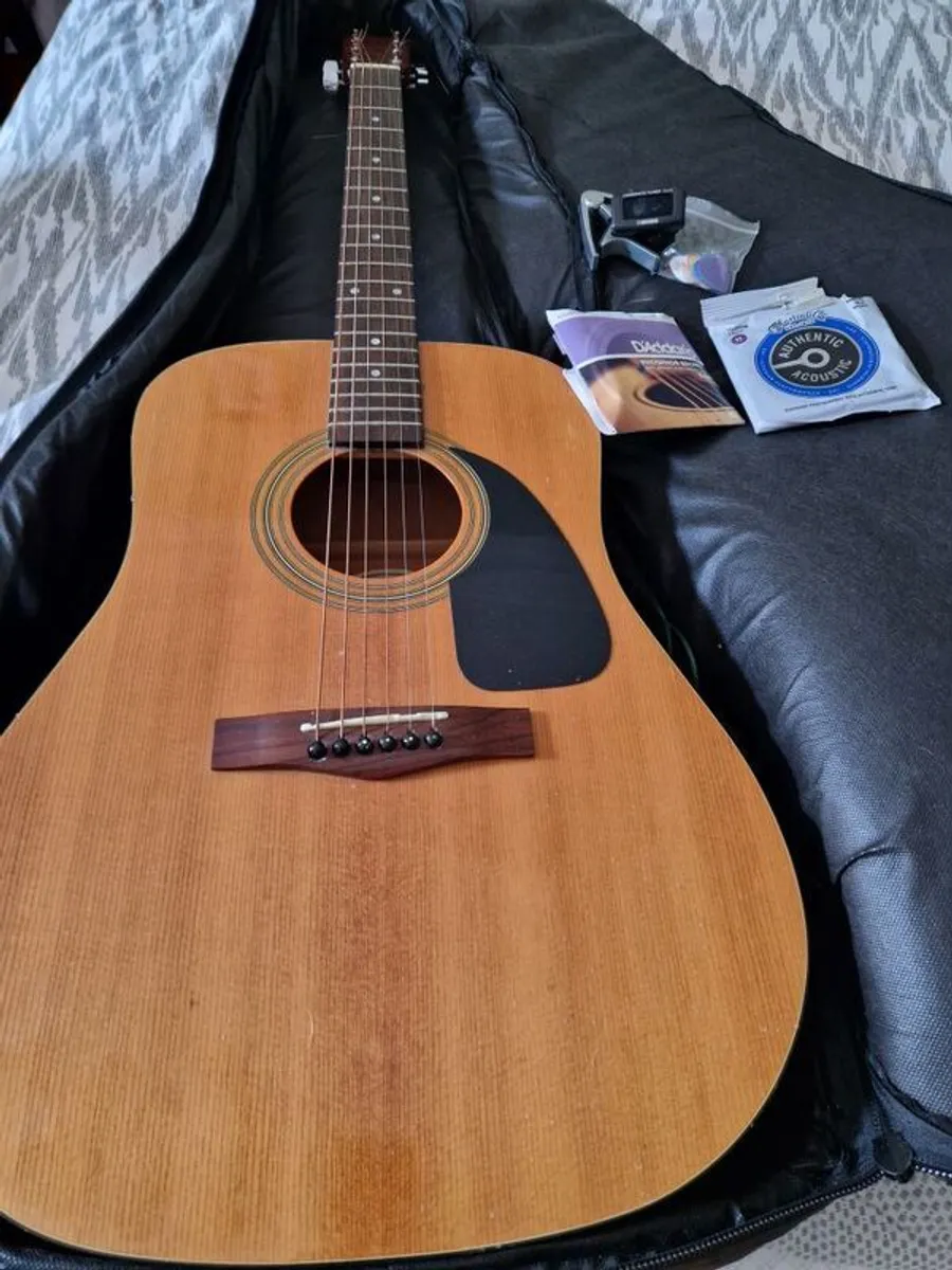 Guitar + case, strings,tuner + - Image 1