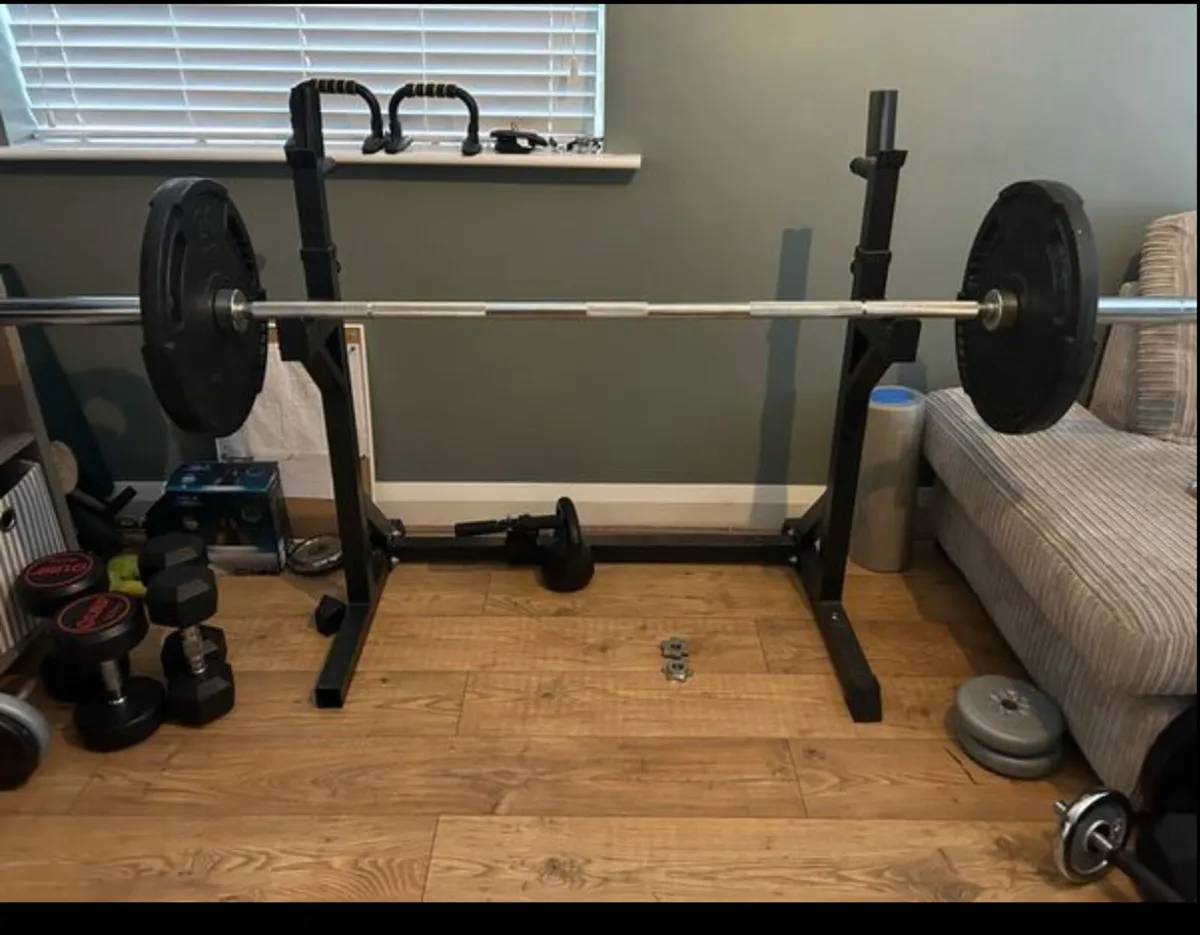 Bench press rack and barbell