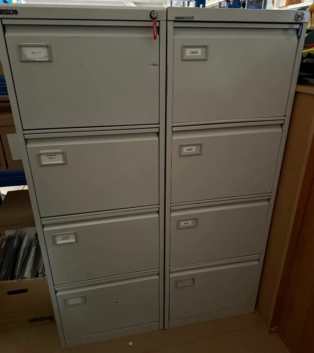 Four drawer filing cabinets x 2